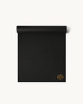 Neosava Lizard Pro Minuit black premium yoga mat with sleek minimalist design for yoga, pilates, stretching, meditation, and elevated home workout practice.