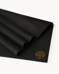 Neosava Lizard Pro Minuit minimalist workout mat in black, ideal for yoga practice, pilates sessions, stretching, meditation, and home fitness routines.