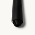 Obsidian black Neosava MineralFlex luxury non-slip yoga mat designed for elegant movement, stable grip, pilates, yoga flow, and daily wellness practice.