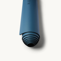 Topaz Neosava MineralFlex luxury non-slip yoga mat with refined minimalist design for stable yoga flow, pilates training, and daily wellness movement.
