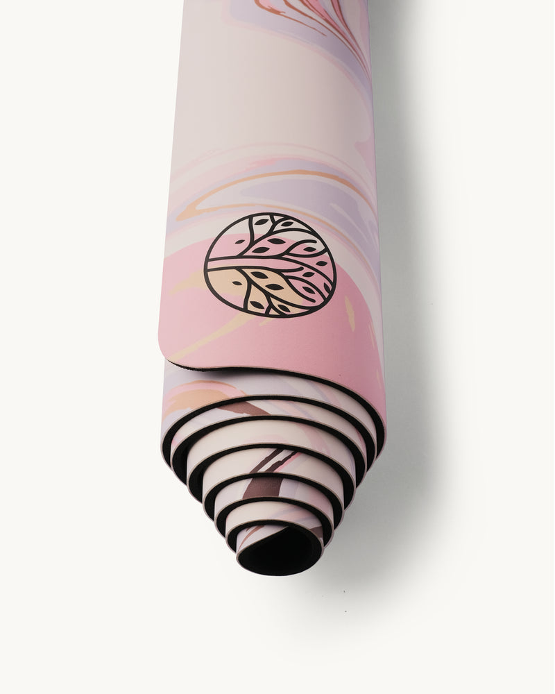 Neosava GalaGrip Cherry Blossom premium yoga mat with soft pink marble design inspired by blooming petals, created for yoga, pilates, meditation, and elegant home practice.