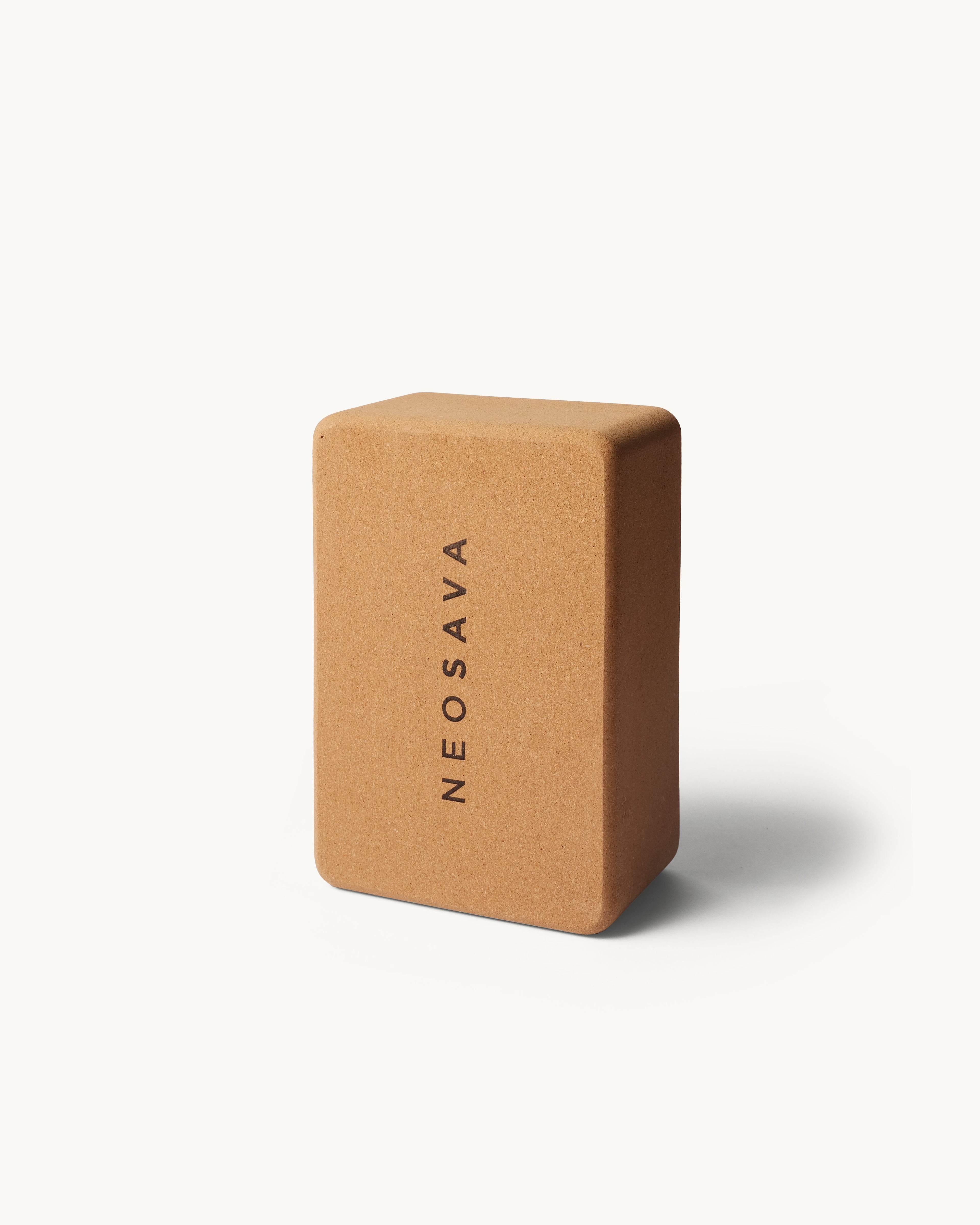 Neosava premium cork yoga block designed for balance support, flexibility training, yoga poses, pilates practice, stretching, posture alignment, home workouts, studio sessions, and daily movement.