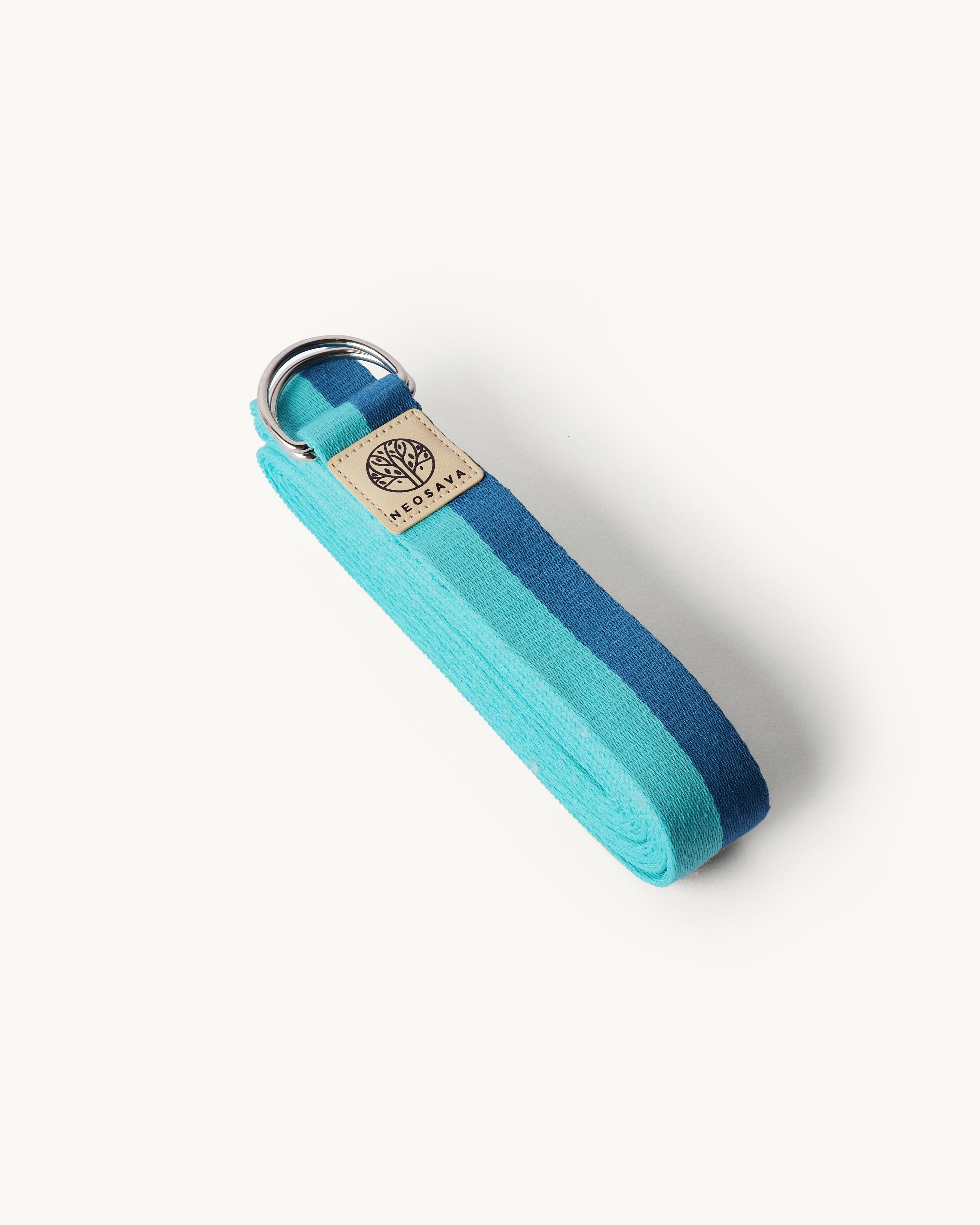 Neosava Sapphire premium yoga strap with refined blue tone for flexibility training, yoga poses, pilates practice, stretching support, posture alignment, mobility work, and daily wellness routines.