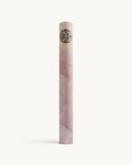 Strawberry Quartz Neosava luxury foldable yoga mat featuring delicate pink stone-inspired artwork, ideal for travel yoga, pilates practice, studio sessions, and refined wellness rituals.