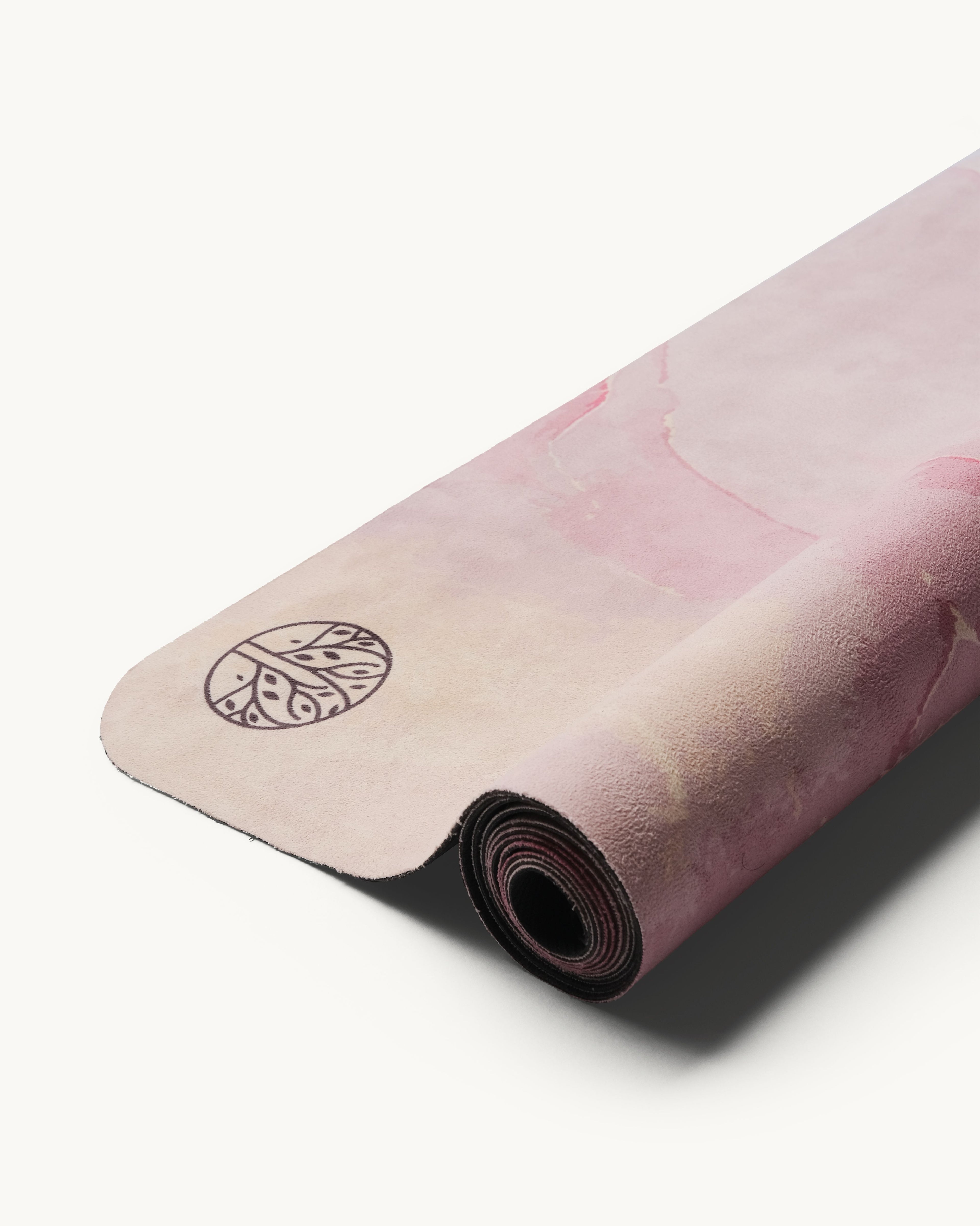 Neosava Travelmat Strawberry Quartz signature travel mat with romantic pink abstract design, perfect for lightweight yoga practice, pilates, meditation, and elevated movement anywhere.