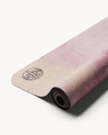 Neosava Travelmat Strawberry Quartz signature travel mat with romantic pink abstract design, perfect for lightweight yoga practice, pilates, meditation, and elevated movement anywhere.